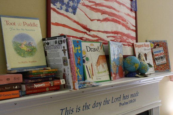 homeschool books on the mantel