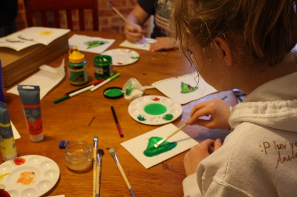 Peter Pan Art Lesson with Nana of ChalkPastel. Nana had sketched her Peter Pan hat with markers before she came to share her lesson. We pulled out the chalk pastels and we listened to Nana describe the basic shape of the hat.