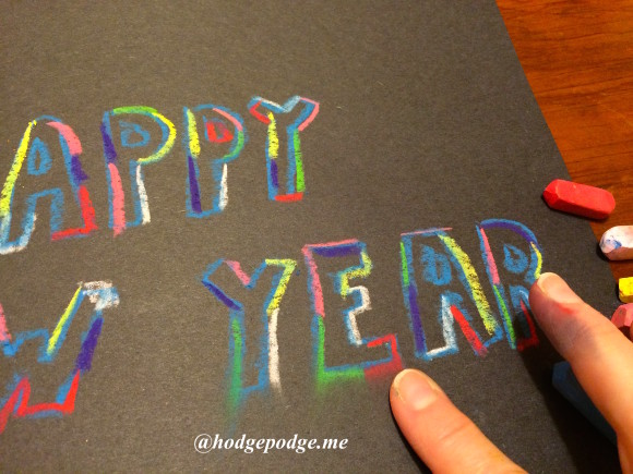 Happy New Year rainbow chalk art